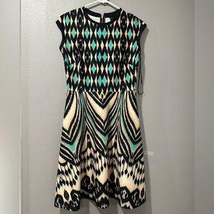 Just...Taylor Scuba Peacock Print SleevelessDress-
Size 4